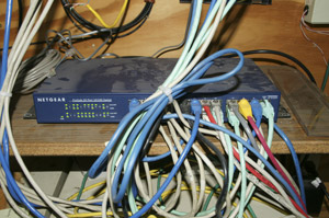 BEFORE photo of old, slow, unmanaged LAN switch.